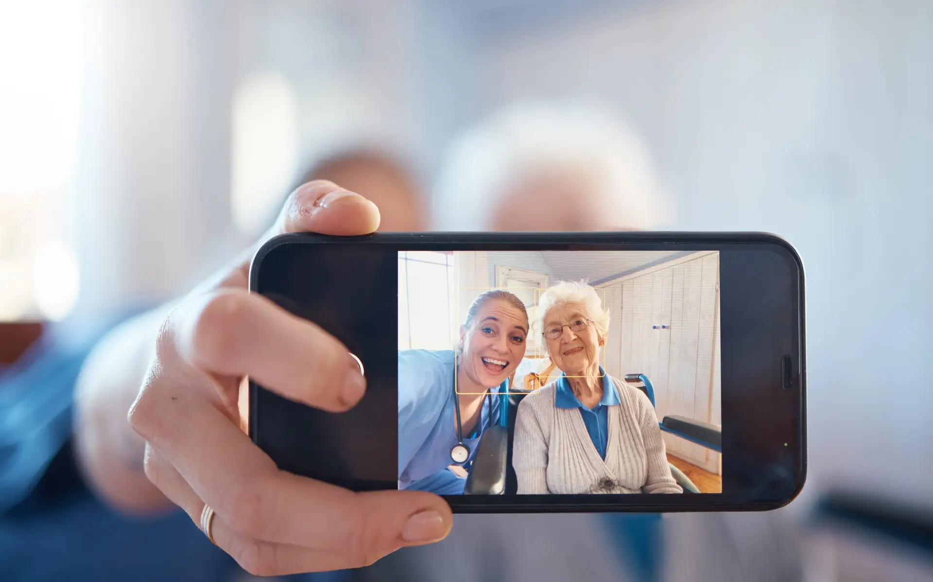 Phone, nurse and happy old woman take a selfie after a medical check and consulting with a doctor. .